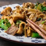 Delicious udon noodles with beef and brocolli