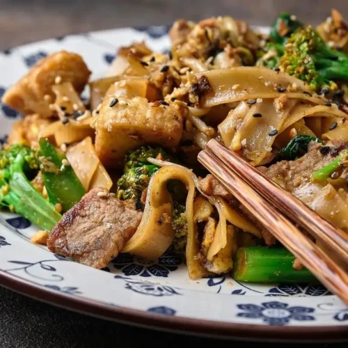 Delicious udon noodles with beef and brocolli