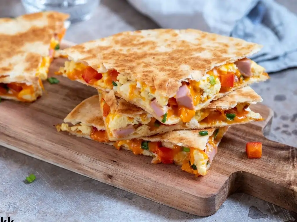 Scramble eggs vegetables ham quesadilla